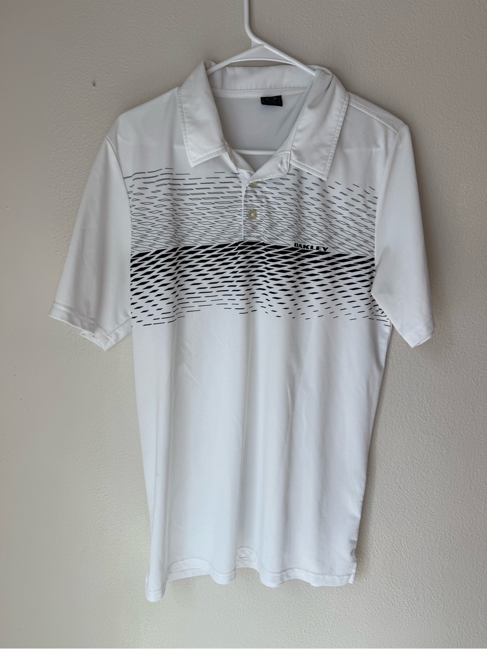 Oakley White Polo with Black Wave Graphic